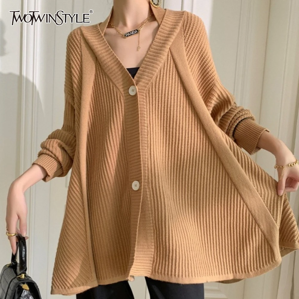 TWOTWINSTYLE Solid Spliced Buttom Loose Casual Sweater for Women V Neck Long Sleeve Top Female Fashion Style
TWOTWINSTYLE Solid Spliced Buttom Loose Casual Sweater for Women V Neck Long Sleeve Top Female Fashion Style