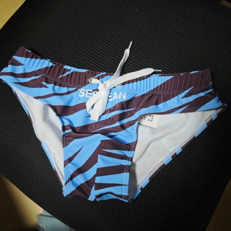 2026 New Original photo shoot multi-style seaside beach men's fashion drawstring swimming trunks new personalized shorts260903
2026 New Original photo shoot multi-style seaside beach men's fashion drawstring swimming trunks new personalized shorts260903