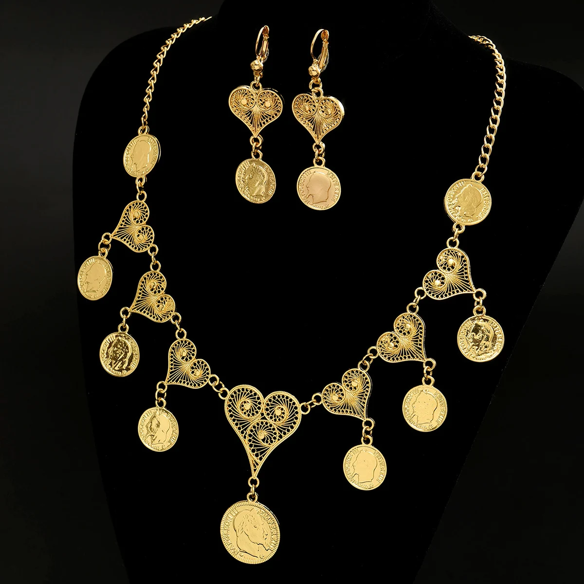 Bohemian Hollow Heart Golden Jewelry Set Embossed Coin Pendant Necklace Earrings for Formal Occasions
Bohemian Hollow Heart Golden Jewelry Set Embossed Coin Pendant Necklace Earrings for Formal Occasions