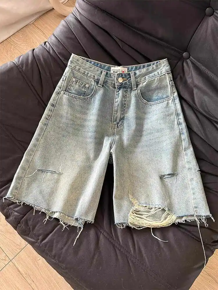 Летние женские джинсовые шорты с высокой талией на молнии, рваные джинсы длиной до колена, американские повседневные модные женские шорты в стиле ретро
Летние женские джинсовые шорты с высокой талией на молнии, рваные джинсы длиной до колена, американские повседневные модные женские шорты в стиле ретро