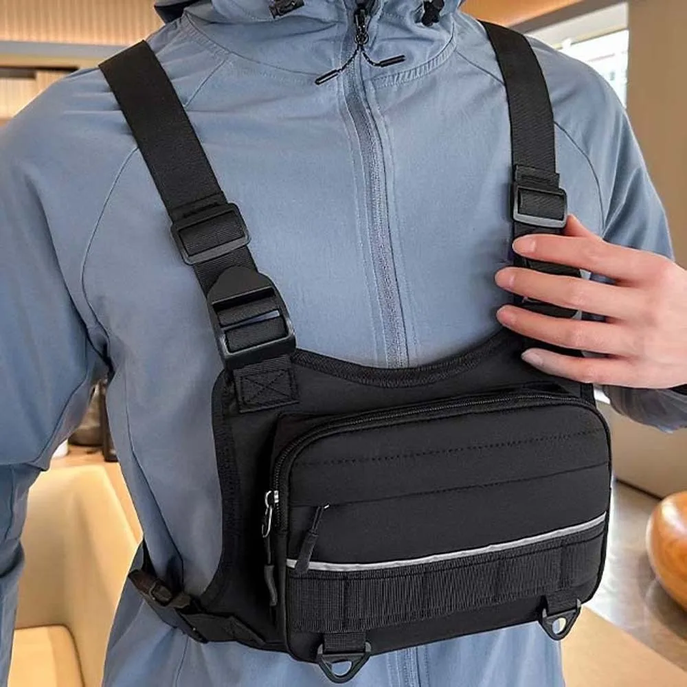 Oxford Cloth Unisex Chest Rig with Webbing Two Tone Design Motorcycle Vest Pack Reflective Line Orange Cord Pull
Oxford Cloth Unisex Chest Rig with Webbing Two Tone Design Motorcycle Vest Pack Reflective Line Orange Cord Pull