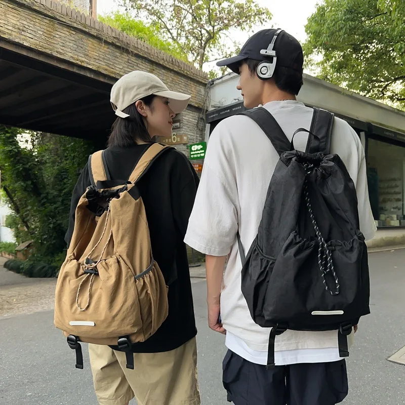 New Backpack for Women Nylon Texture Korean Style Drawstring Sports Travel Bag Simple Solid Color Portable Travel Tennis Bag
New Backpack for Women Nylon Texture Korean Style Drawstring Sports Travel Bag Simple Solid Color Portable Travel Tennis Bag