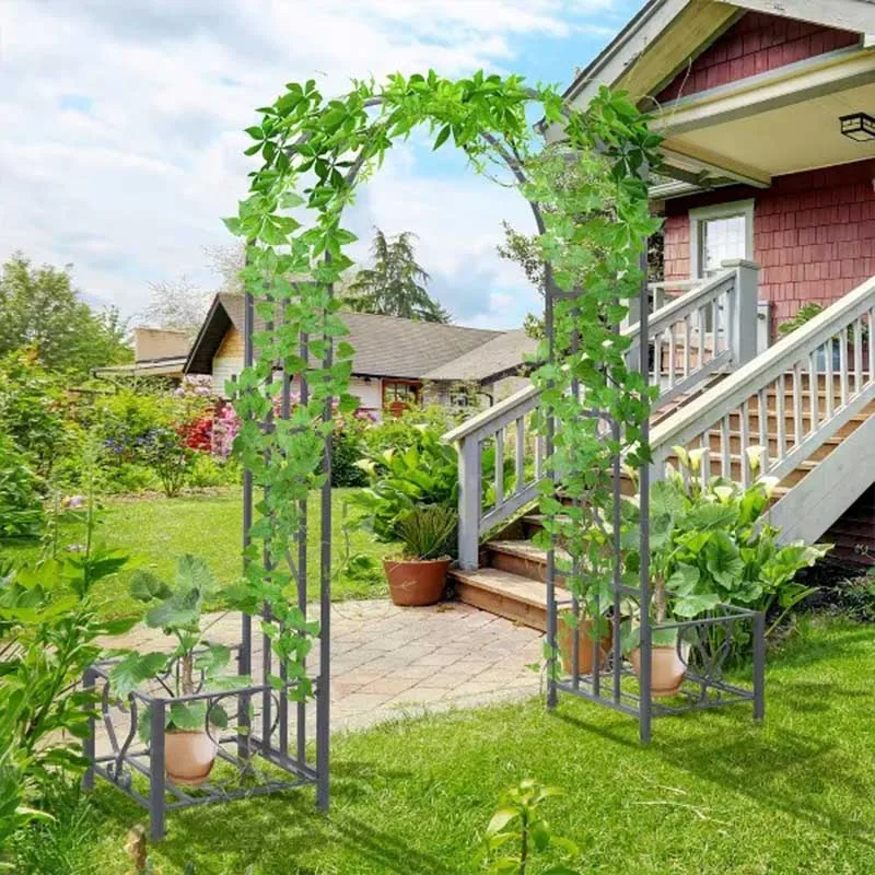 Metal garden gazebo with flower boxes and various climbing plants wedding arch
Metal garden gazebo with flower boxes and various climbing plants wedding arch