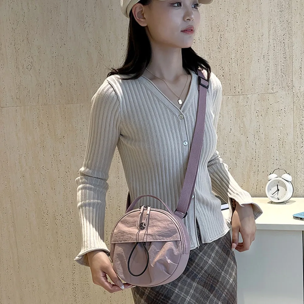 Cute Nylon Mobile Phone Storage Bag Casual Korean Style Small Round Handbag Large Capacity Purse Mini Crossbody Bag Female
Cute Nylon Mobile Phone Storage Bag Casual Korean Style Small Round Handbag Large Capacity Purse Mini Crossbody Bag Female
