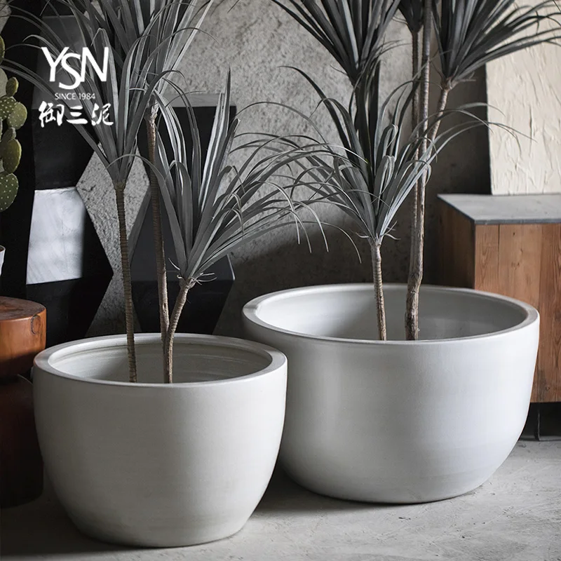 Large caliber ceramic flower pots, white ceramic jar ornaments, planting vats, courtyard decorations, floor pots
Large caliber ceramic flower pots, white ceramic jar ornaments, planting vats, courtyard decorations, floor pots