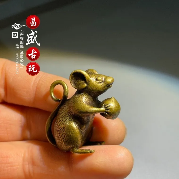 Composite coated brass solid zodiac mouse holding peach tool composite small toy copper mouse
Composite coated brass solid zodiac mouse holding peach tool composite small toy copper mouse