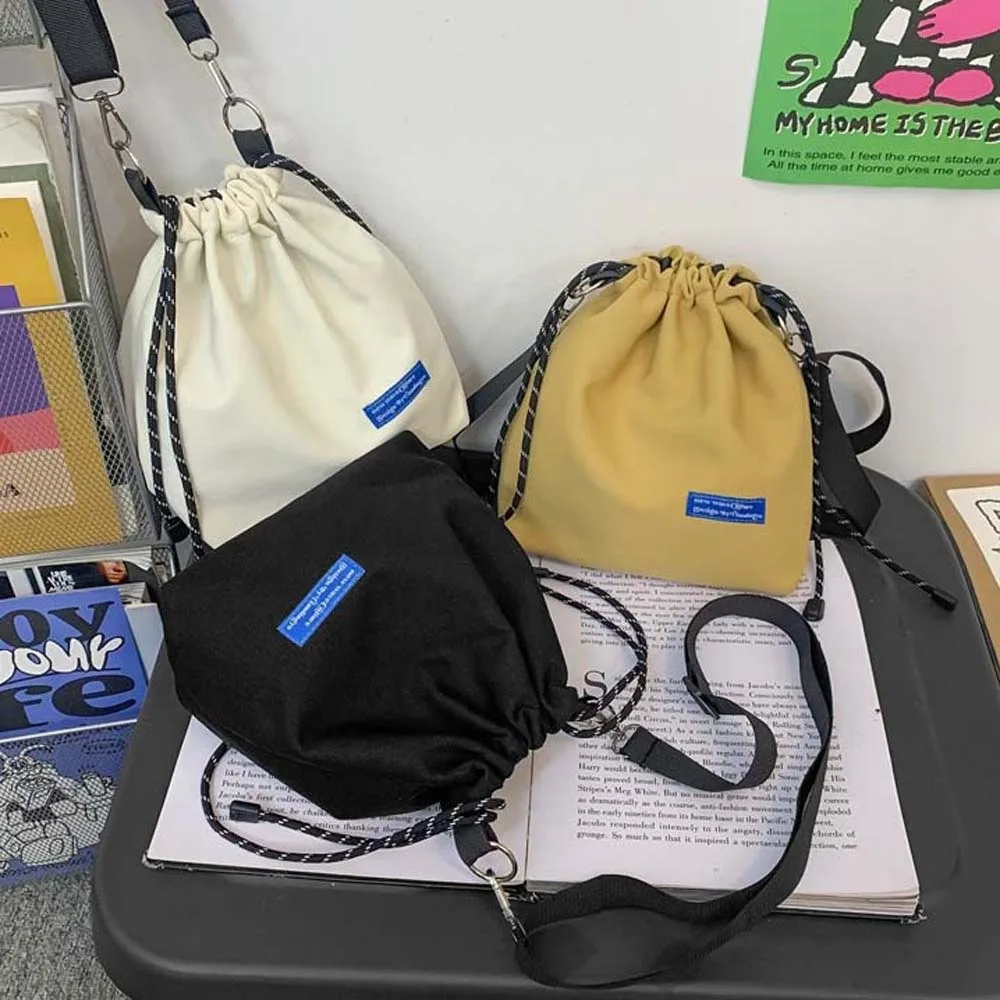 Нейлоновая сумка-ведро на шнурке, регулируемая сумка через плечо в корейском стиле, черная/белая/желтая сумка, мужская сумка через плечо
Нейлоновая сумка-ведро на шнурке, регулируемая сумка через плечо в корейском стиле, черная/белая/желтая сумка, мужская сумка через плечо
