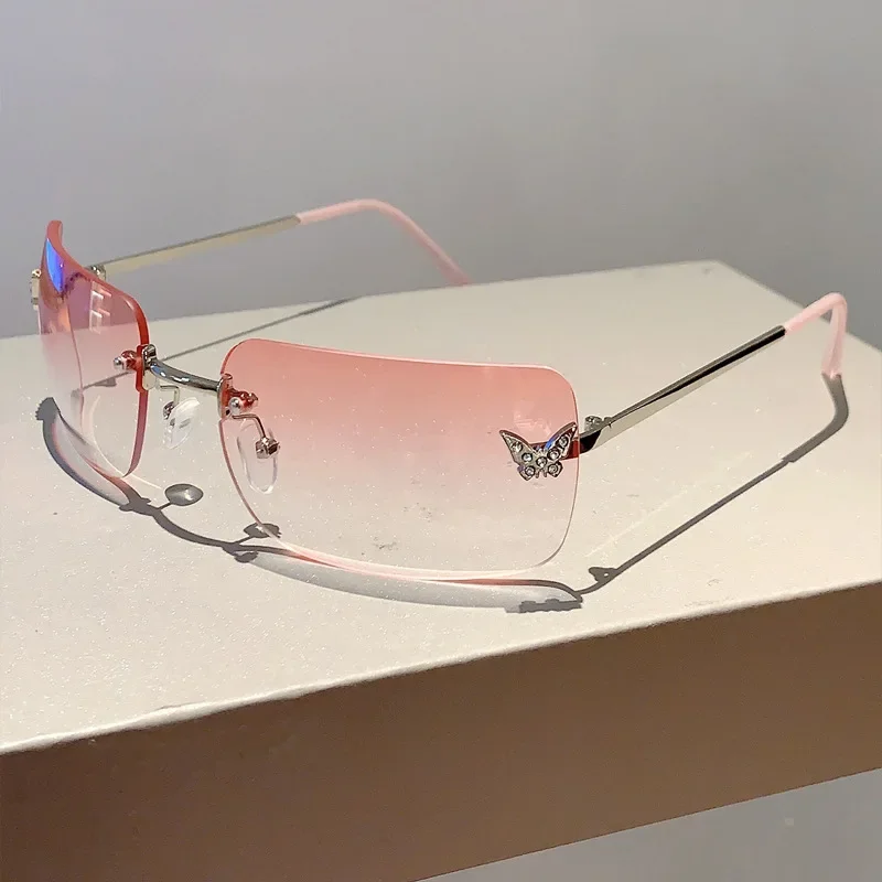 Y2K Luxury Brand Designer Rimless Square Sunglasses Women For Female Trendy Sun Glasses Diamond Butterfly Pink Punk Shades UV400
Y2K Luxury Brand Designer Rimless Square Sunglasses Women For Female Trendy Sun Glasses Diamond Butterfly Pink Punk Shades UV400
