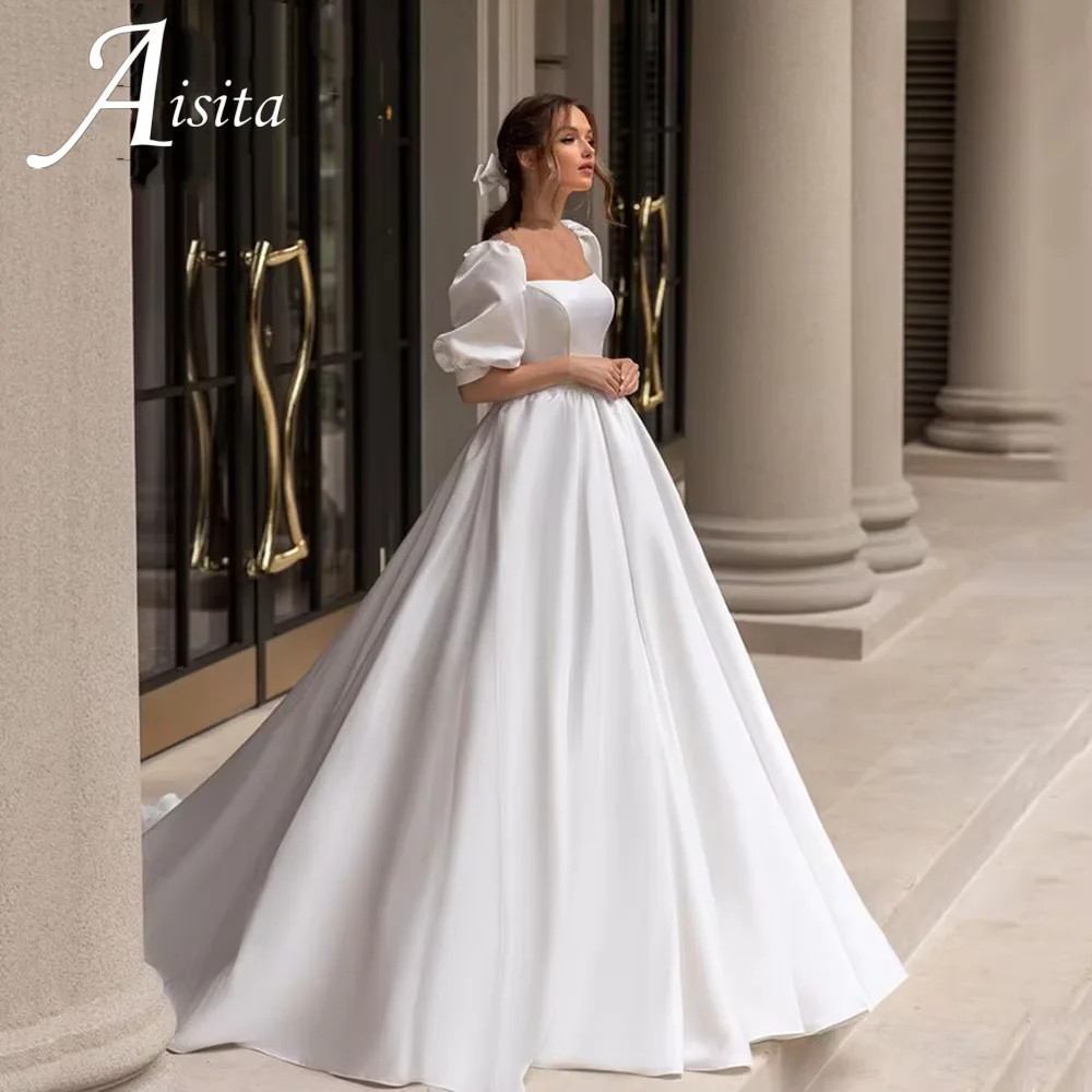 A Line Wedding Dresses Customized Slit Satin Square Collar Bride Dress Long Wedding Gowns Short Sleeves 2025 Detachable Sleeves
A Line Wedding Dresses Customized Slit Satin Square Collar Bride Dress Long Wedding Gowns Short Sleeves 2025 Detachable Sleeves