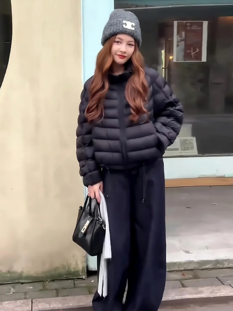 Korean Sle ort Rib Bone down Jaet Women's Winter Bla Stand Collar Lightweight Warm Versatile 90 White Du down Coat
Korean Sle ort Rib Bone down Jaet Women's Winter Bla Stand Collar Lightweight Warm Versatile 90 White Du down Coat