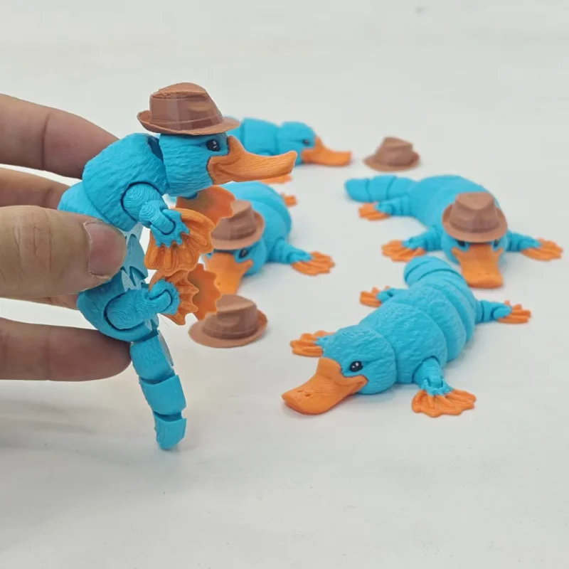Solo Piece Sweet Animal Theme Stylish Hat Platypus Statue Freely Moving Limbs 3D Printed Work Relax Toy Festival Surprise Gift
Solo Piece Sweet Animal Theme Stylish Hat Platypus Statue Freely Moving Limbs 3D Printed Work Relax Toy Festival Surprise Gift