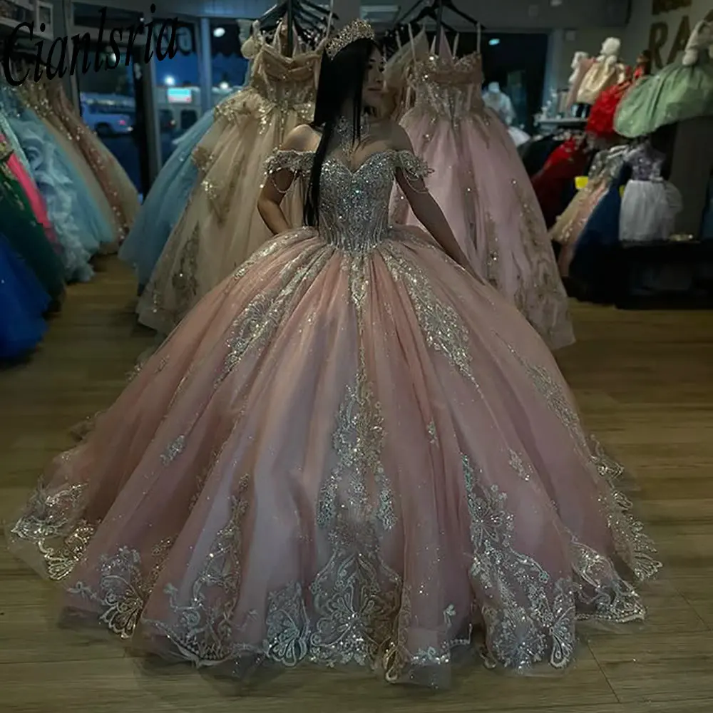 Розовые платья Quinceanera с открытыми плечами, бальное платье с аппликациями из бисера, кружево Sweet 15, мексиканский индивидуальный заказ
Розовые платья Quinceanera с открытыми плечами, бальное платье с аппликациями из бисера, кружево Sweet 15, мексиканский индивидуальный заказ