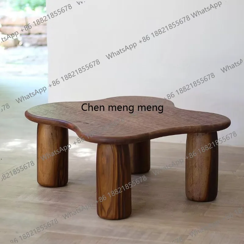 Carved coffee table, special-shaped solid wood living room, small apartment, simple and high-end coffee table
Carved coffee table, special-shaped solid wood living room, small apartment, simple and high-end coffee table