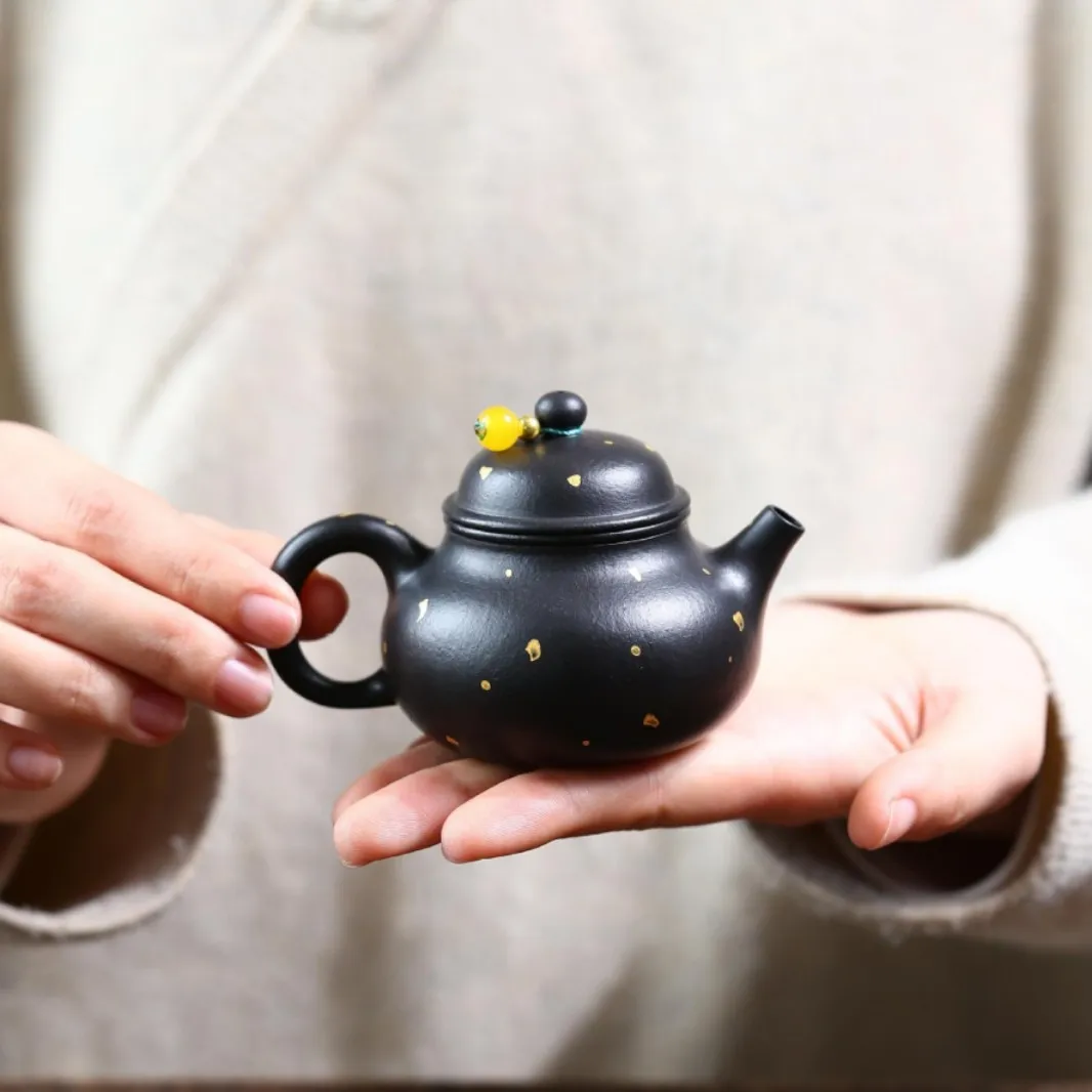 Yixing Zisha Rongtian Teapot, Semi-Handmade, Thin-Walled, Made From Raw Mineral Zhuni Clay With Sprinkles And Gold Detailing, Av
Yixing Zisha Rongtian Teapot, Semi-Handmade, Thin-Walled, Made From Raw Mineral Zhuni Clay With Sprinkles And Gold Detailing, Av