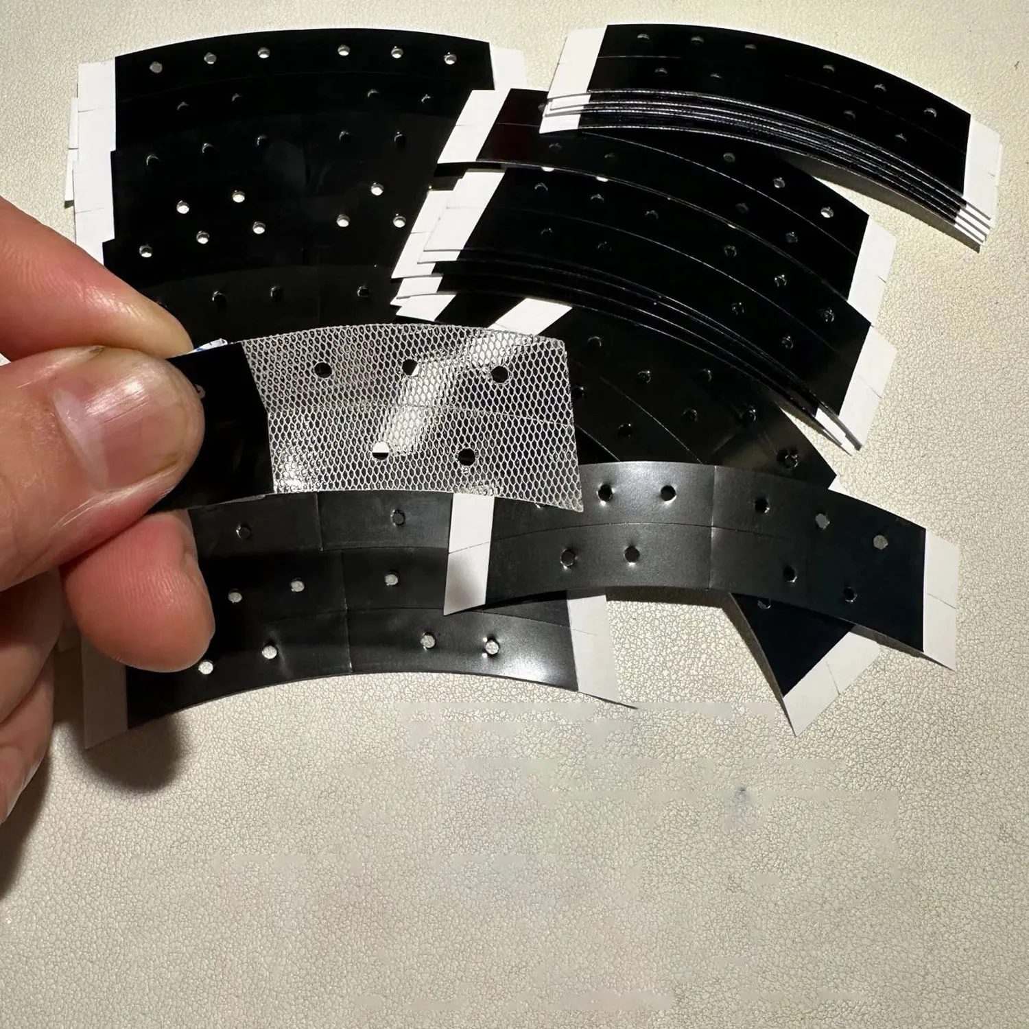 36 pieces 7.6 cm* 2.2 cm black ouble side tape with holes lace front wig tape arc double sided Tape for toupee wig adhesive
36 pieces 7.6 cm* 2.2 cm black ouble side tape with holes lace front wig tape arc double sided Tape for toupee wig adhesive