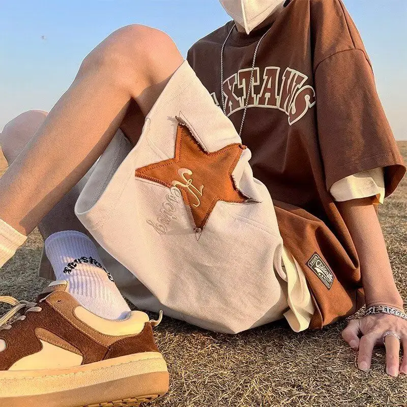 Мужские лоскутные шорты с вышитыми звездами, летние эластичные повседневные молодежные стильные брюки с пятью точками, свободная спортивная мужская одежда
Мужские лоскутные шорты с вышитыми звездами, летние эластичные повседневные молодежные стильные брюки с пятью точками, свободная спортивная мужская одежда