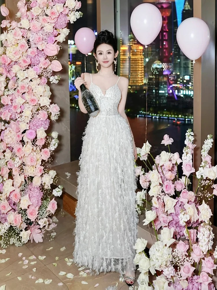 Elegant V-Neck High Slit Wedding Dress Feathers Evening Gown Long Skirt Fashionable Simple Color High Waist Chinese Production
Elegant V-Neck High Slit Wedding Dress Feathers Evening Gown Long Skirt Fashionable Simple Color High Waist Chinese Production