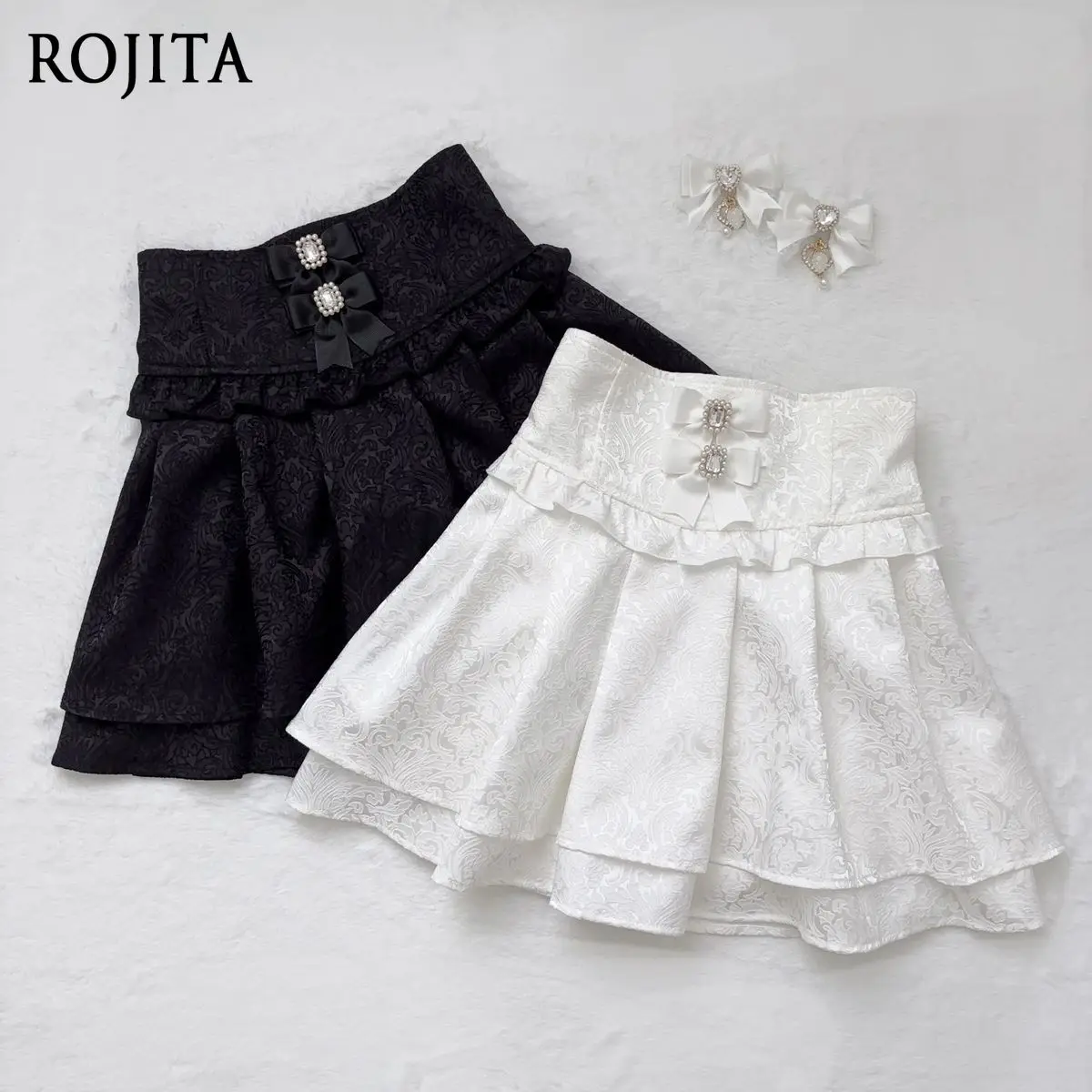 Women's Jirai Kei High-Waisted Mini Skirt Tiered Ruffle with Bow Rhinestone Detail Gothic Lolita High Waist Jacquard Skirt
Women's Jirai Kei High-Waisted Mini Skirt Tiered Ruffle with Bow Rhinestone Detail Gothic Lolita High Waist Jacquard Skirt