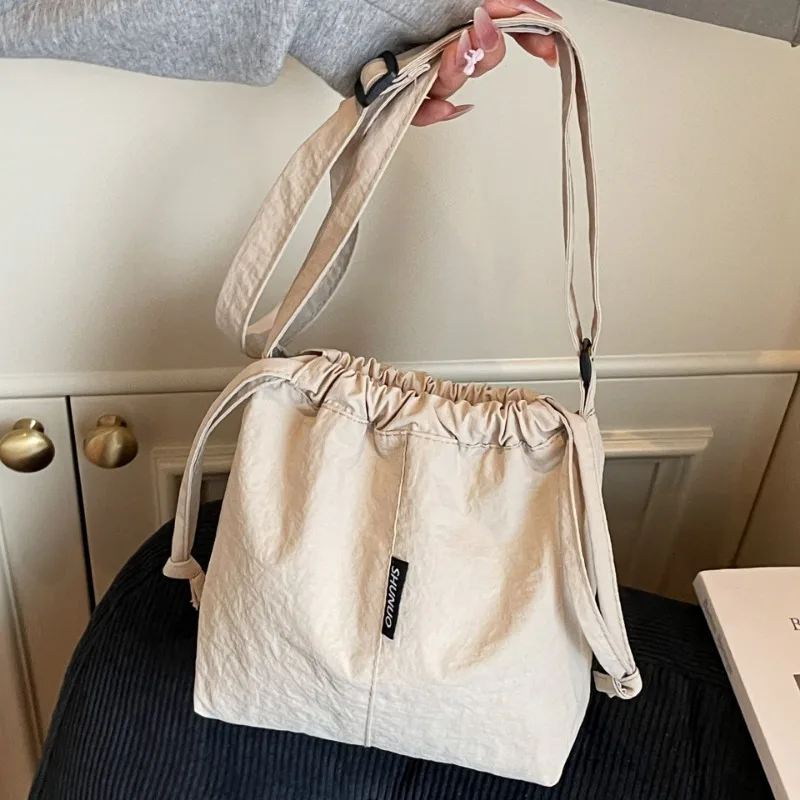 1pcs Versatile Japanese Korean Style Casual Mini Bag for Women Lightweight Crossbody Drawstring Shoulder Bag
1pcs Versatile Japanese Korean Style Casual Mini Bag for Women Lightweight Crossbody Drawstring Shoulder Bag