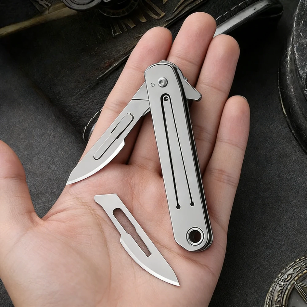 Художественный нож из нержавеющей стали для наружного использования, удобный складной, брелок, быстрая разборка, No. 23-лезвие для домашнего использования
Художественный нож из нержавеющей стали для наружного использования, удобный складной, брелок, быстрая разборка, No. 23-лезвие для домашнего использования