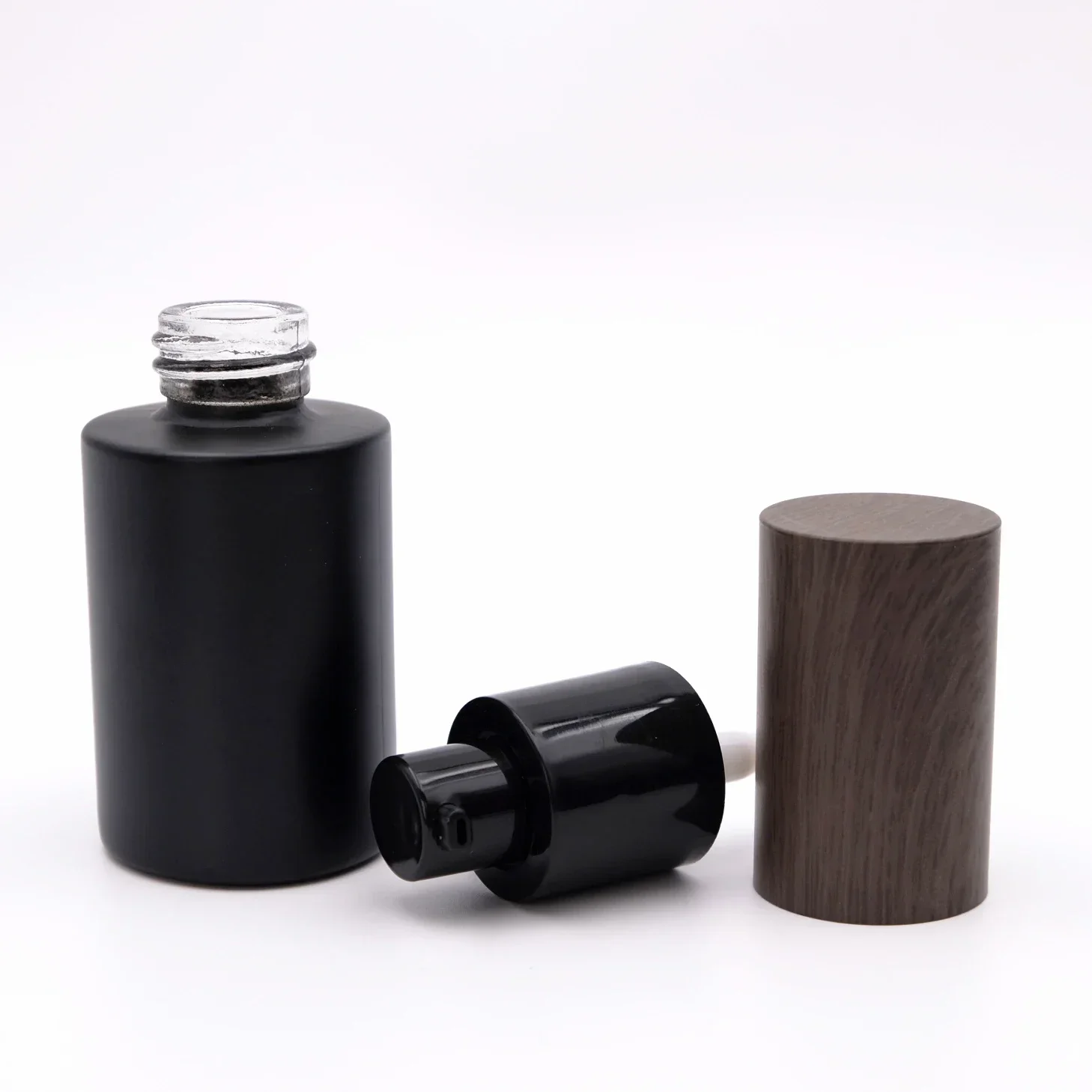 Luxury Matt Black Wooden Cap Lotion Bottle Glass Hair Oil Bottle Skin CareClear Cosmetic Glass Eye Cream Jar Frosted Storage Pot
Luxury Matt Black Wooden Cap Lotion Bottle Glass Hair Oil Bottle Skin CareClear Cosmetic Glass Eye Cream Jar Frosted Storage Pot