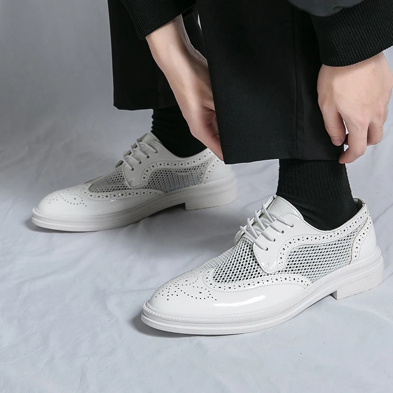 Brand Fashion Lacquer Lace Comfortable Casual Leather Shoes 2026 Classic Spring New Men's Mesh Business Block Leather Shoes
Brand Fashion Lacquer Lace Comfortable Casual Leather Shoes 2026 Classic Spring New Men's Mesh Business Block Leather Shoes