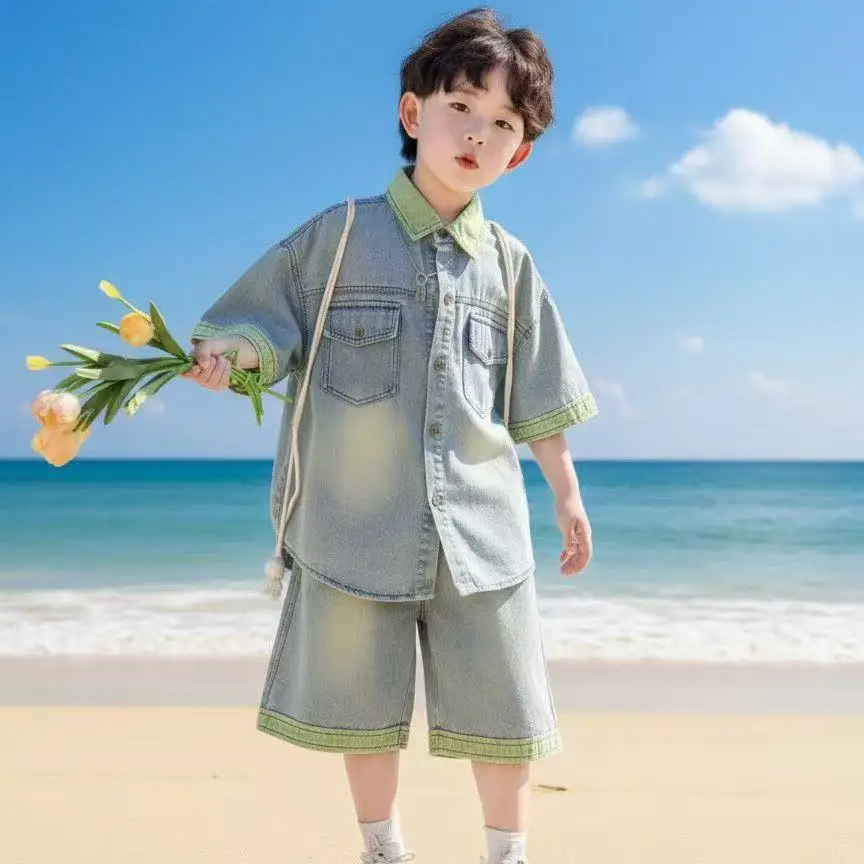 Children's Summer Set New Fashionable Cool Handsome Thin Denim Short Sleeve Boys' Loose Shorts Two Piece Set
Children's Summer Set New Fashionable Cool Handsome Thin Denim Short Sleeve Boys' Loose Shorts Two Piece Set
