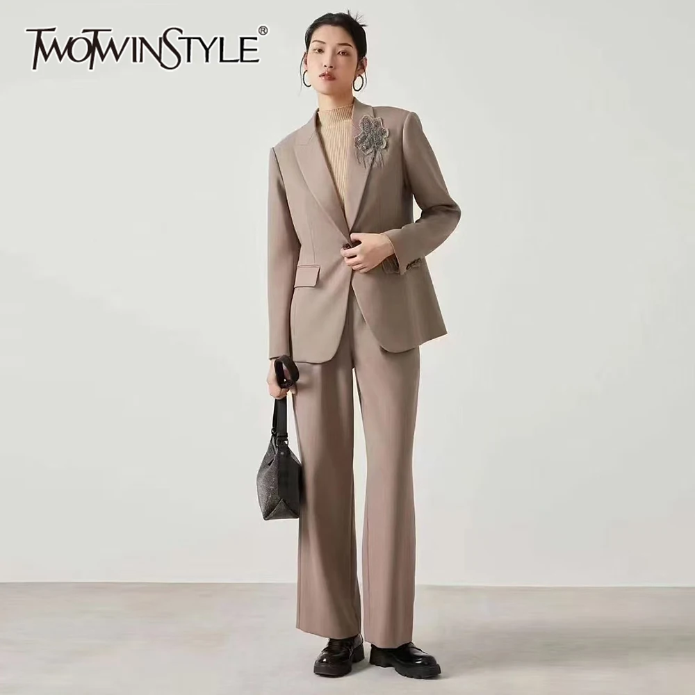 TWOTWINSTYLE Solid Two Piece Set for Women Lapel Long Sleeve Patchwork Embroidery Top High Waist Wide Leg Pant Sets Female New
TWOTWINSTYLE Solid Two Piece Set for Women Lapel Long Sleeve Patchwork Embroidery Top High Waist Wide Leg Pant Sets Female New