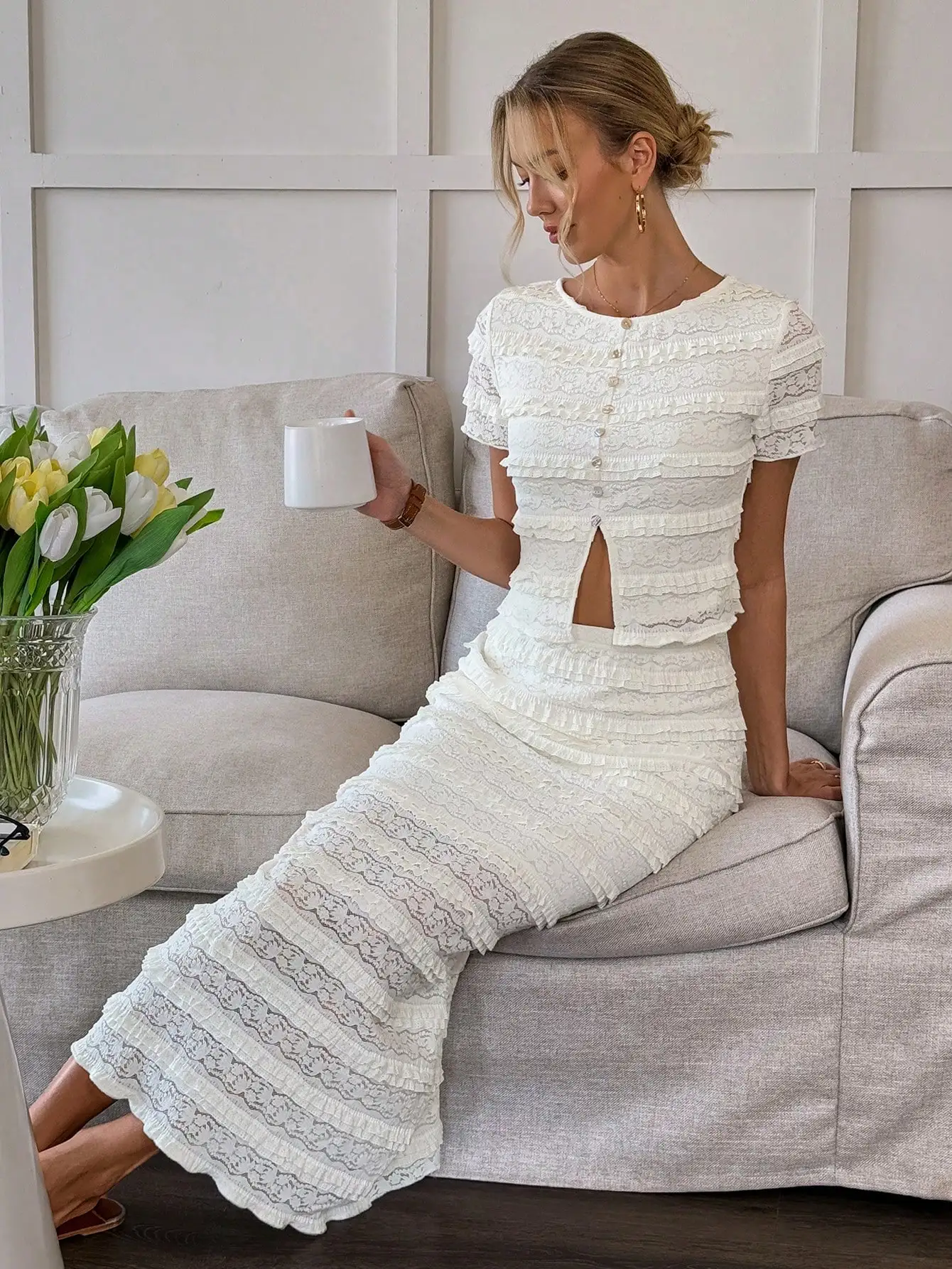 Women Two Piece Lace Outfit With Ruffles And Cutout Detail
Women Two Piece Lace Outfit With Ruffles And Cutout Detail
