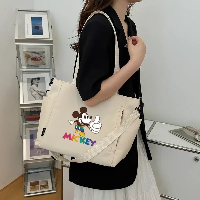 Disney Mickey Mouse Female Large Capacity Shoulder Messenger Bag Cute New Cartoon Handbag Student storage Tote Bag
Disney Mickey Mouse Female Large Capacity Shoulder Messenger Bag Cute New Cartoon Handbag Student storage Tote Bag