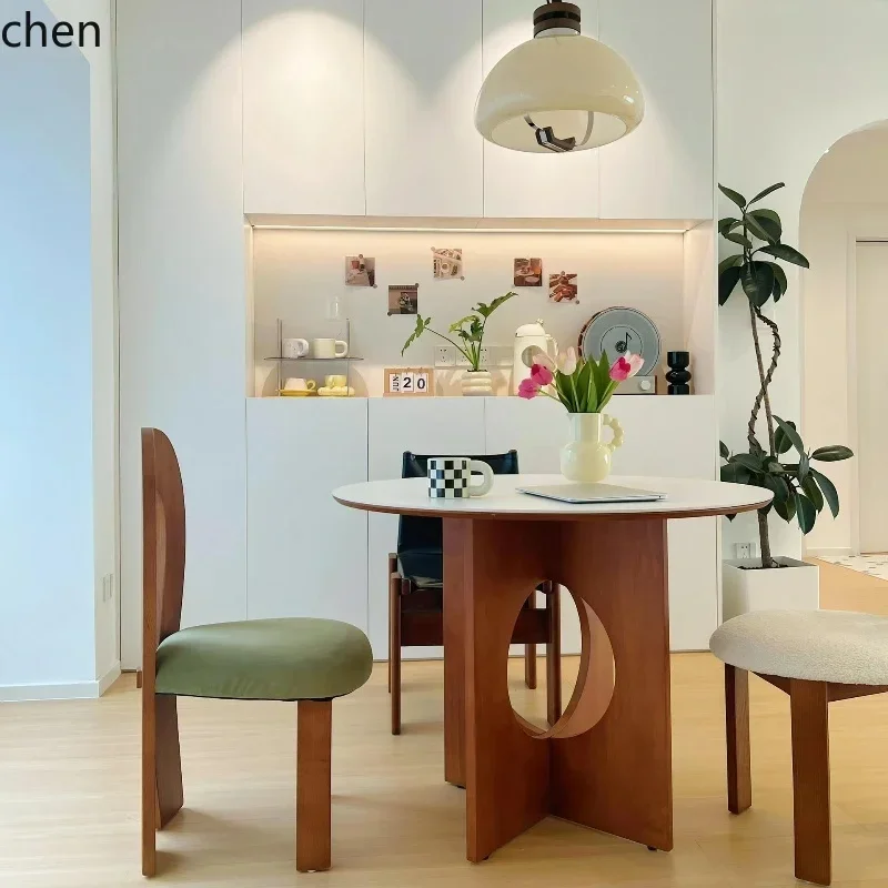 retro style solid wood round rock slab dining table modern simple medium antique dining table and chair combination
retro style solid wood round rock slab dining table modern simple medium antique dining table and chair combination