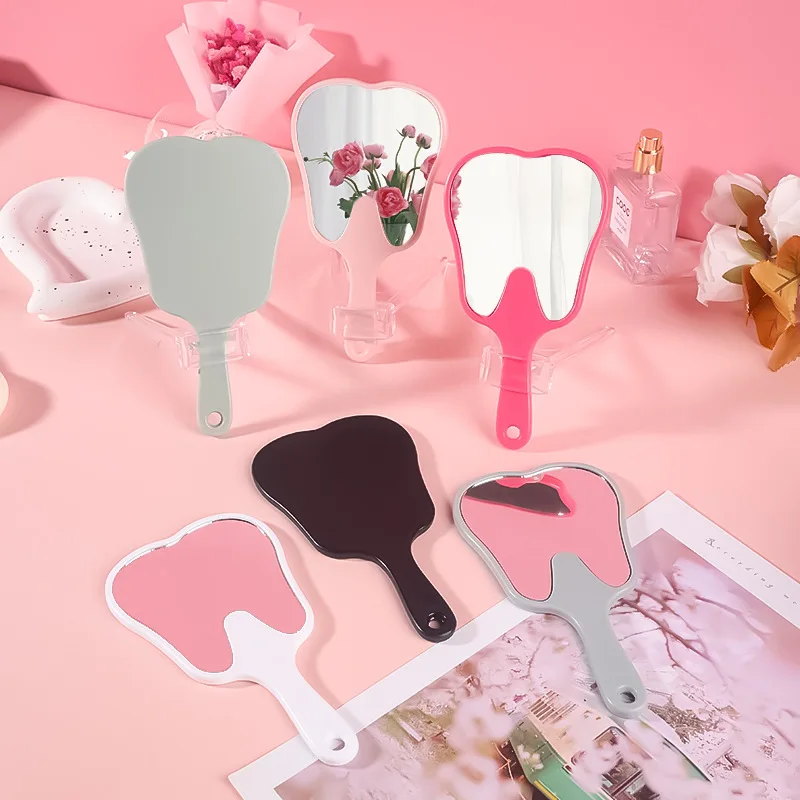 200Pcs Tooth Shaped Handheld Mirror Cute Makeup Mirror Hand Held Dental Mirrors With Handle High Definition RX
200Pcs Tooth Shaped Handheld Mirror Cute Makeup Mirror Hand Held Dental Mirrors With Handle High Definition RX