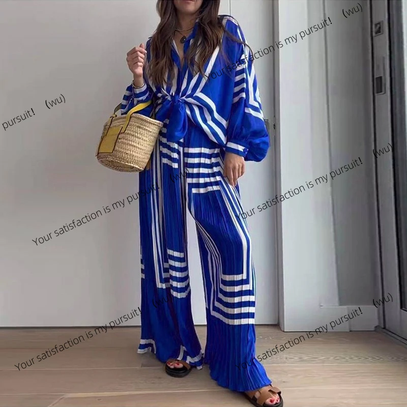 Spring new women's casual fashion printed long-sleeved shirt pleated wide-leg pants
Spring new women's casual fashion printed long-sleeved shirt pleated wide-leg pants