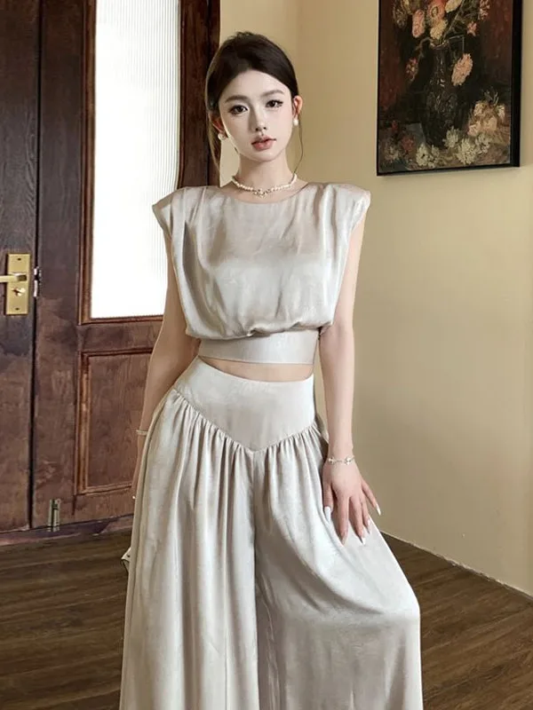 Elegant Casual Loose Women's Sleeveless Top And Wide Leg Pants Two-Piece Set Fashionable Summer Outfit round Neck Long Pants
Elegant Casual Loose Women's Sleeveless Top And Wide Leg Pants Two-Piece Set Fashionable Summer Outfit round Neck Long Pants