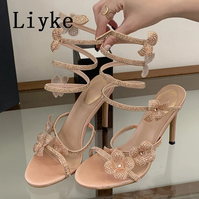 Liyke Street Style Sexy Crystal Flower Snake Twine Around Ankle Strap High Heels Sandals Women Open Toe Wedding Banquet Shoes
Liyke Street Style Sexy Crystal Flower Snake Twine Around Ankle Strap High Heels Sandals Women Open Toe Wedding Banquet Shoes