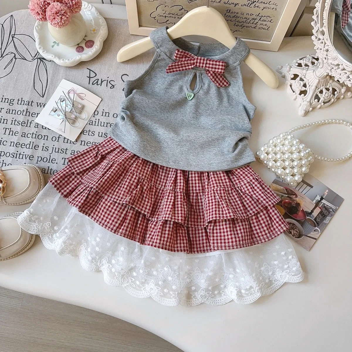 Korean Style Summer New Girls' Bow Tank Top + Plaid Lace-trimmed Tiered Skirt Casual 2-Piece Outfit Street Fashion
Korean Style Summer New Girls' Bow Tank Top + Plaid Lace-trimmed Tiered Skirt Casual 2-Piece Outfit Street Fashion