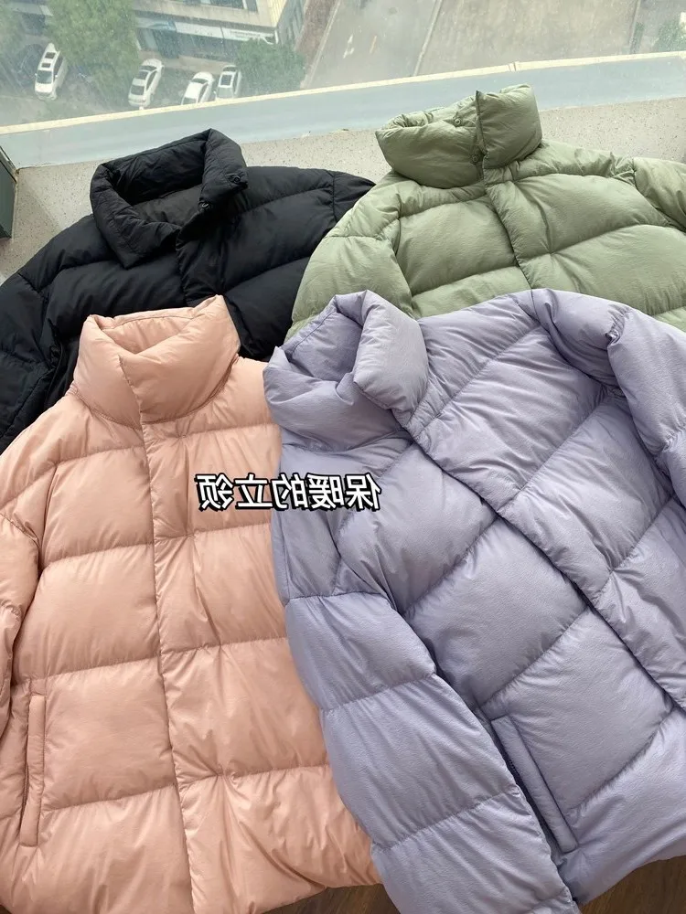 Out of season warm and light white duck down candy color stand collar short jacket female
Out of season warm and light white duck down candy color stand collar short jacket female