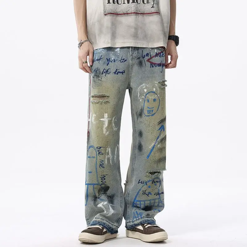 American high street graffiti ripped painted jeans summer men's loose denim pants baggy jeans streetwear men jeans for men
American high street graffiti ripped painted jeans summer men's loose denim pants baggy jeans streetwear men jeans for men