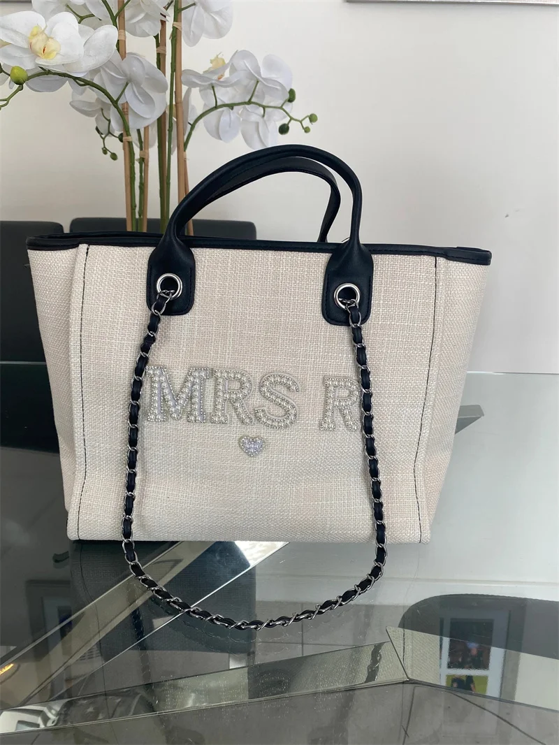 Personalised bridal Pearl handbag, woven bag, bridal shower gift, honeymoon gift, gifts for bride,bride to be hen party
Personalised bridal Pearl handbag, woven bag, bridal shower gift, honeymoon gift, gifts for bride,bride to be hen party