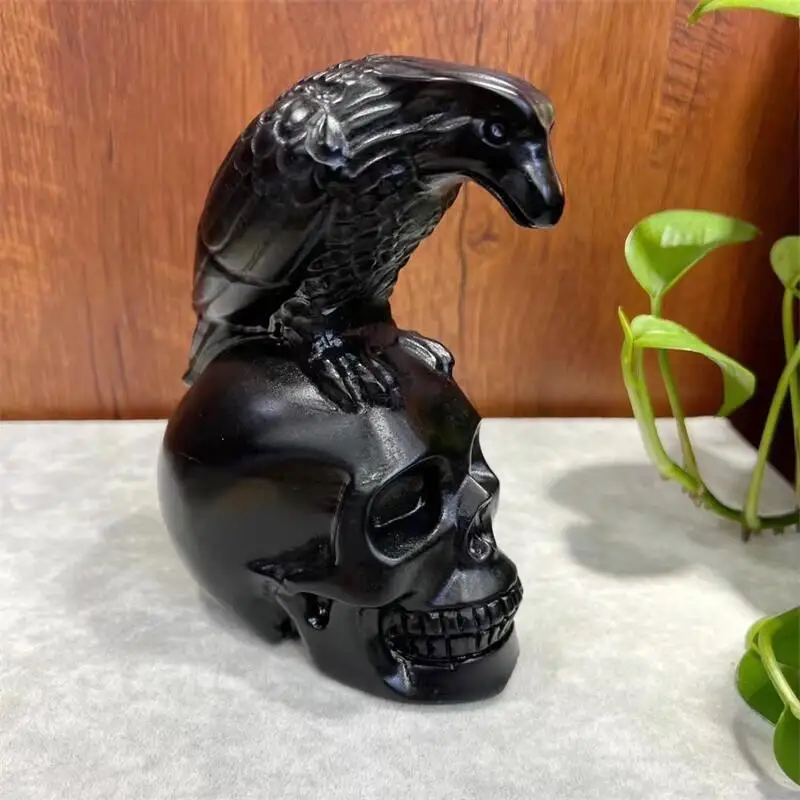 14.5cm Natural Obsidian Hand-carved Animal Crow Skull Carved Crystal Ornaments Halloween Home Decoration Gift
14.5cm Natural Obsidian Hand-carved Animal Crow Skull Carved Crystal Ornaments Halloween Home Decoration Gift