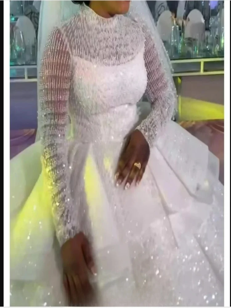 Customized African High Collar Shinny Beads Sequins Ballgown Wedding Dress Robe De Mariee Luxe Long Sleeves Bridal Gown
Customized African High Collar Shinny Beads Sequins Ballgown Wedding Dress Robe De Mariee Luxe Long Sleeves Bridal Gown