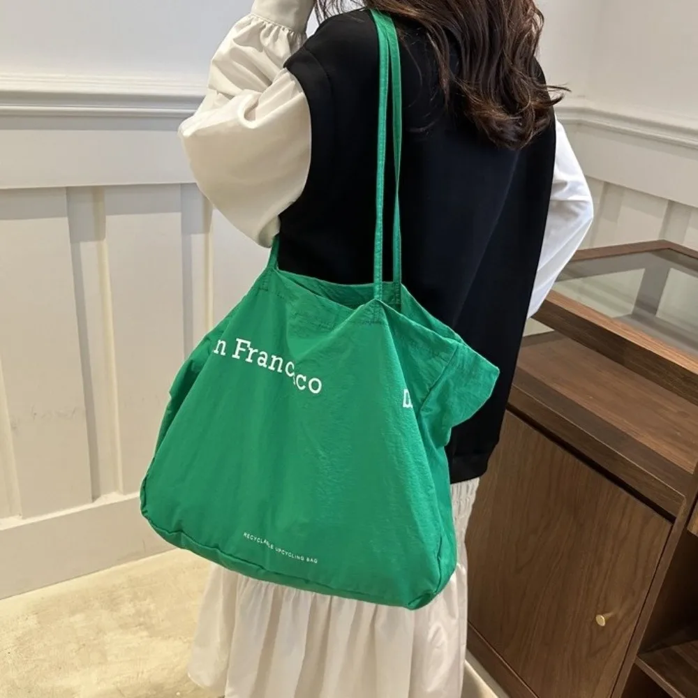Simple Large Capacity Canvas Shoulder Bag Solid Color Letter Print Tote Bag Shopping Bag Street Style Underarm Bag Students
Simple Large Capacity Canvas Shoulder Bag Solid Color Letter Print Tote Bag Shopping Bag Street Style Underarm Bag Students