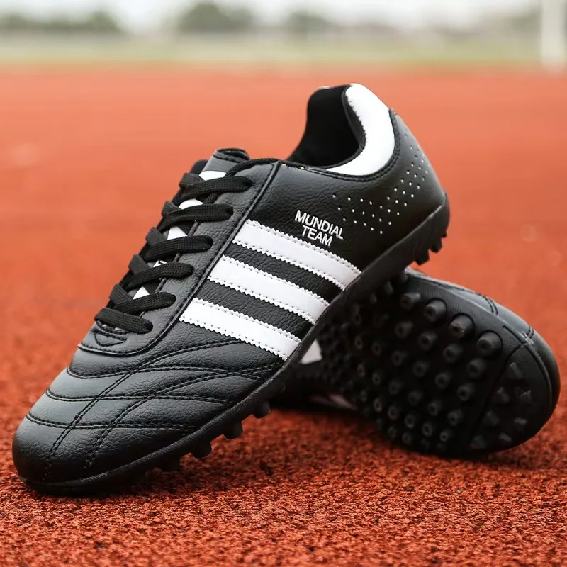 Professional football shoes children's adult grass training sports shoes lightweight anti slip nail shoes for football fields
Professional football shoes children's adult grass training sports shoes lightweight anti slip nail shoes for football fields