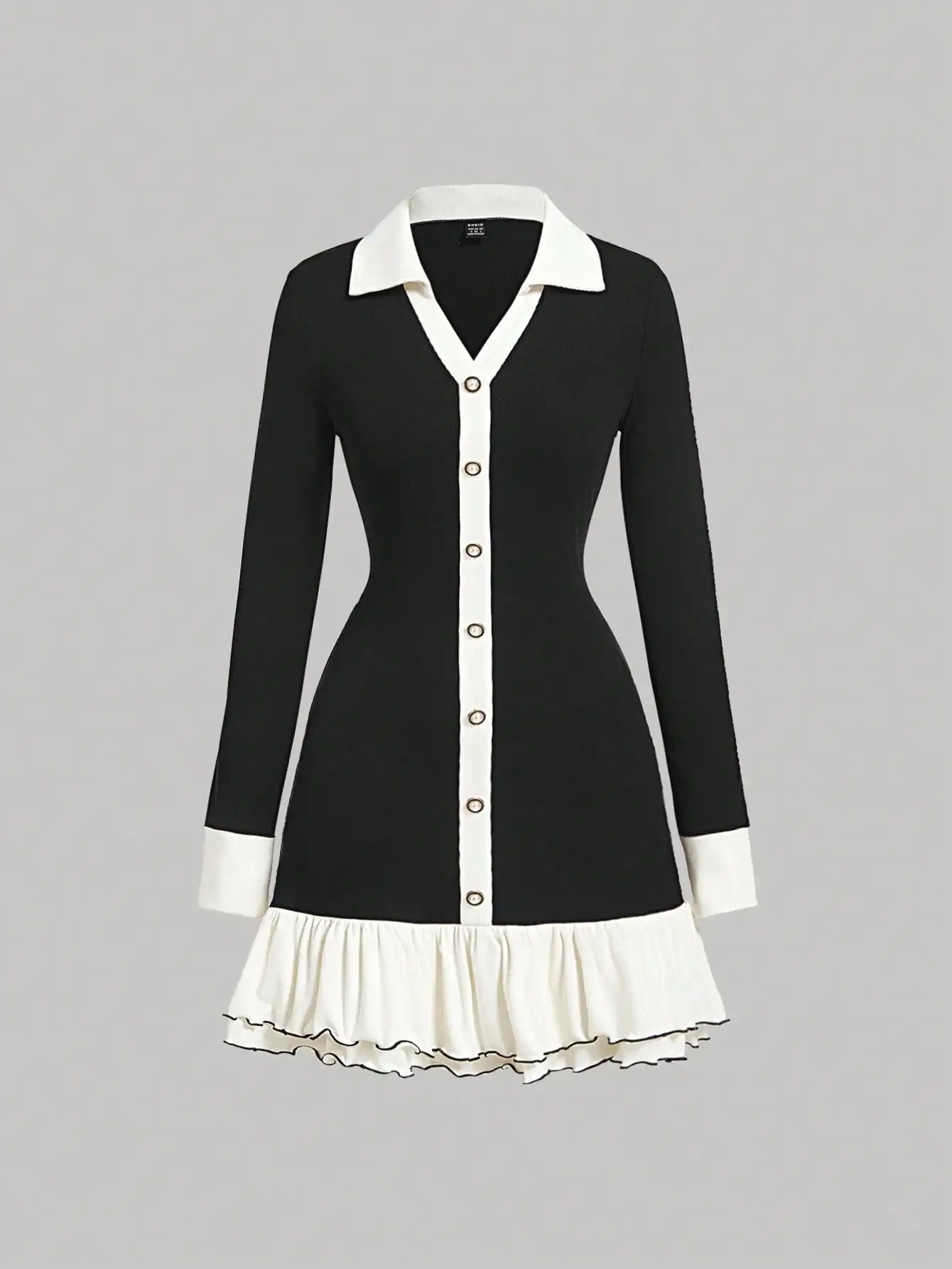 Черно-кремовое трикотажное платье на пуговицах с рюшами по подолу
Черно-кремовое трикотажное платье на пуговицах с рюшами по подолу