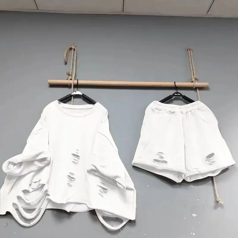 Spring Pullovers Sets Women Beggar Hole Loose Oversized Short Sleeve Top and Wide Leg Shorts Fashion Casual Two Piece Set E8469
Spring Pullovers Sets Women Beggar Hole Loose Oversized Short Sleeve Top and Wide Leg Shorts Fashion Casual Two Piece Set E8469