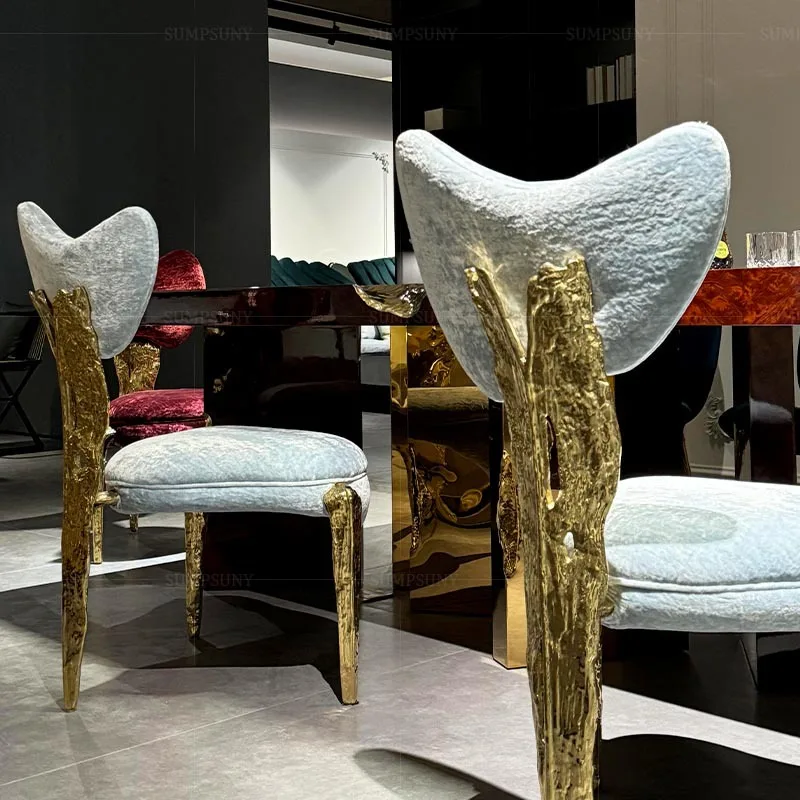 Italian light luxury brass dining chair Home restaurant Modern high-end designer Creative villa Fabric backrest Single chair
Italian light luxury brass dining chair Home restaurant Modern high-end designer Creative villa Fabric backrest Single chair