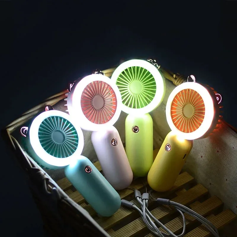 Mini Hand Fan Wrist Hanging Portable Fan Night Light USB Rechargeable Fans For Children And Ladies Summer Air Cooler
Mini Hand Fan Wrist Hanging Portable Fan Night Light USB Rechargeable Fans For Children And Ladies Summer Air Cooler