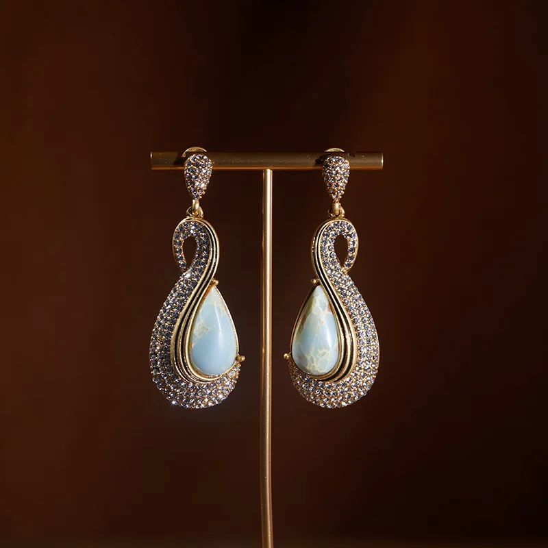 Medium Style Exaggerated Geometric Gemstone Water Drop Earrings High-end Light Luxury Fashion Raw Stone Retro Earrings for Women
Medium Style Exaggerated Geometric Gemstone Water Drop Earrings High-end Light Luxury Fashion Raw Stone Retro Earrings for Women
