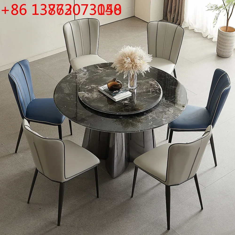 Round table dining table and chairs marble combination simple rock slab simple luxury stone home bright modern dining table
Round table dining table and chairs marble combination simple rock slab simple luxury stone home bright modern dining table