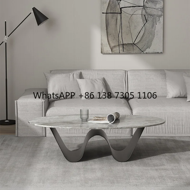 Italian minimalist modern rock slab oval coffee table Nordic light luxury small apartment high-end living room table
Italian minimalist modern rock slab oval coffee table Nordic light luxury small apartment high-end living room table
